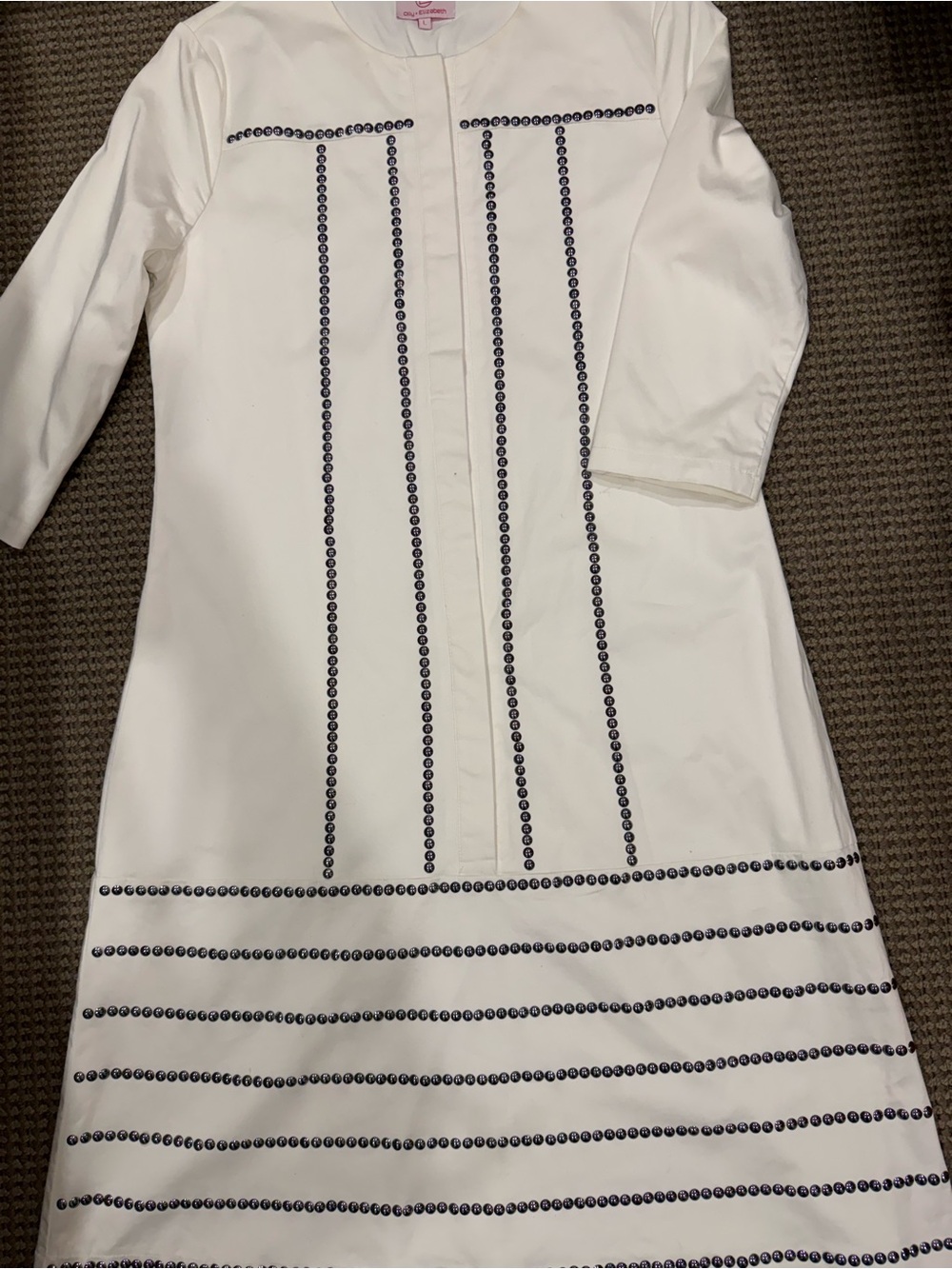 White formal dress with studded design